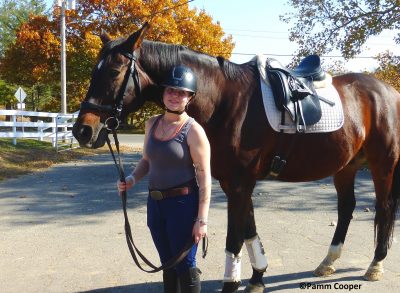 Student & A horse before a riding lesson