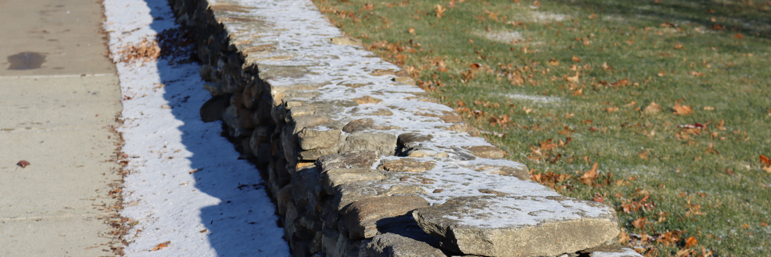 stone wall with snow