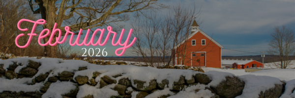 Snow‑covered stone wall in front of a red barn and outbuildings under a winter sky, with “February 2026” written in pink script across the top.